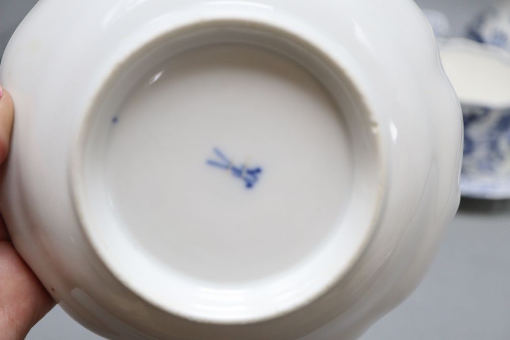 Two Meissen jugs, a cup and saucer and two dishes in blue and white onion pattern, tallest 14cm